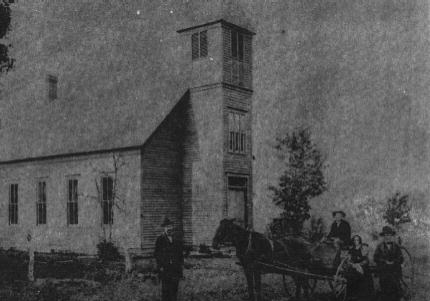 James Stanley and wife in a wagon